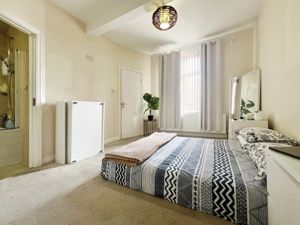 Bedroom One- click for photo gallery